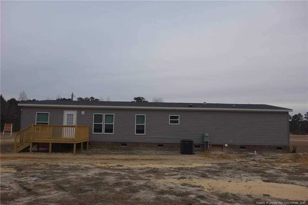 Back view and spacious yard - 30 Old Hickory Lane, Elizabethtown, NC 28337