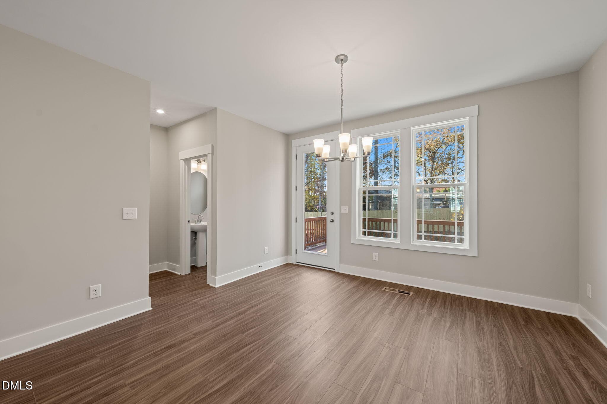 Dining Space with Half Bath - 528 Plumleaf Lane, Durham, NC 27703, Durham