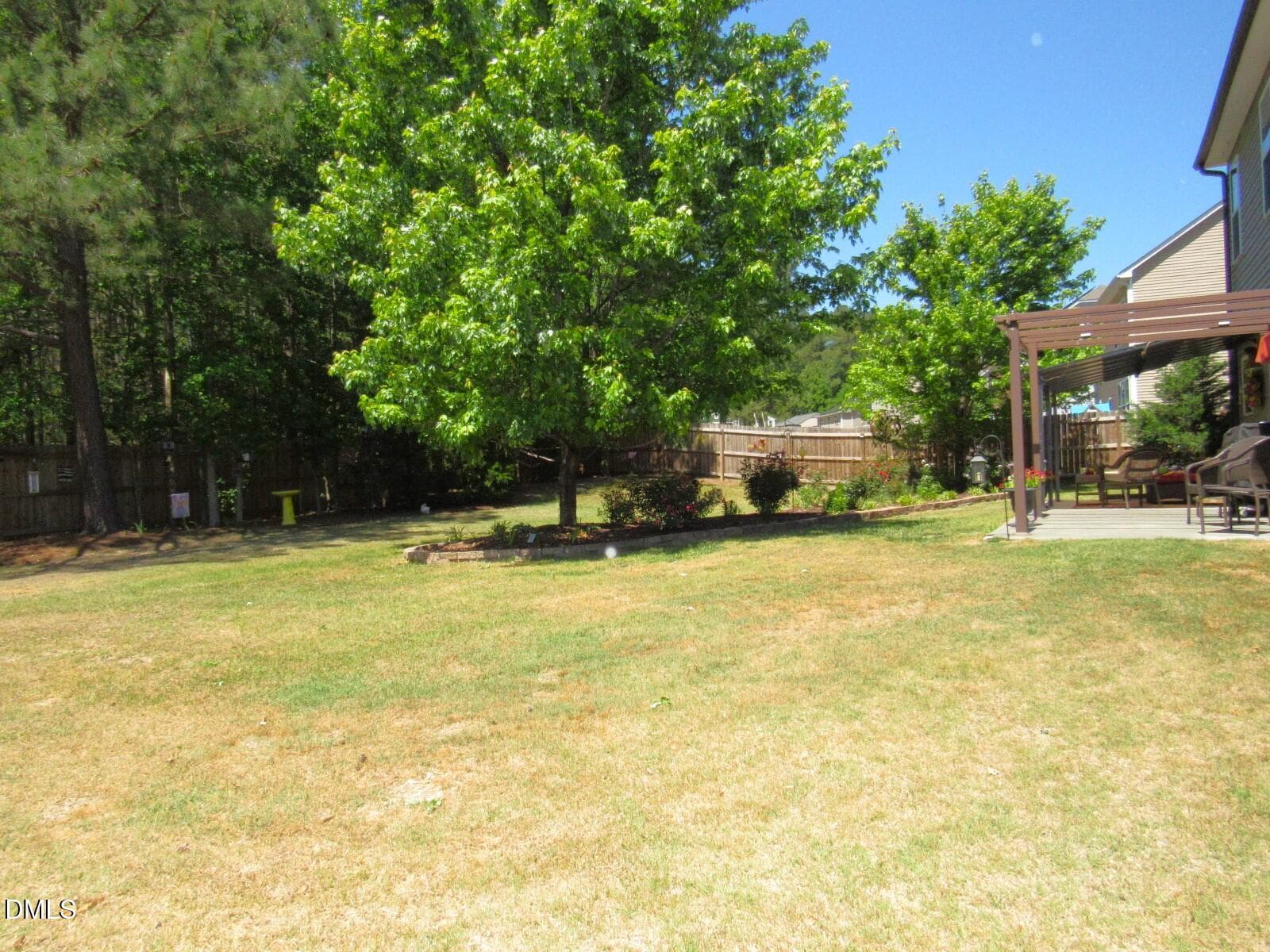 Fenced backyard - 724 Forrest Lane, Creedmoor, NC 27522
