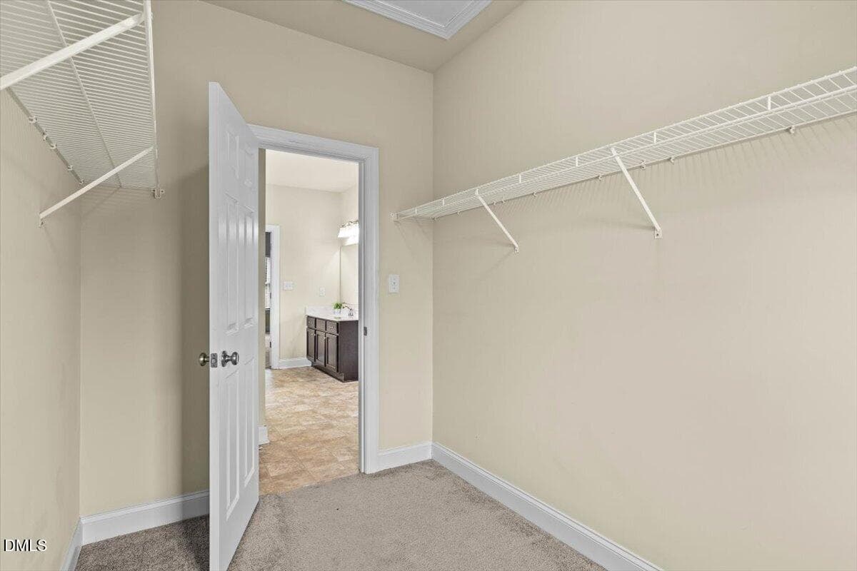 Primary Walk-In Closet - 704 Haw River Hopedale Road, Burlington, NC 27217, Burlington