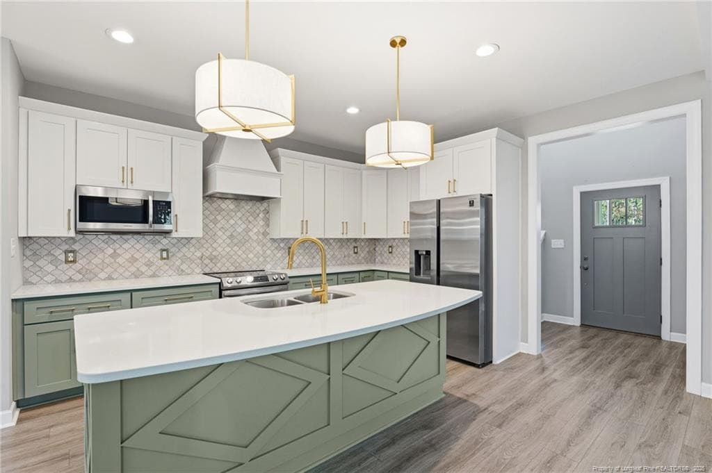 Kitchen with island - 15981 Old Orchard Court, Wagram, NC 28396