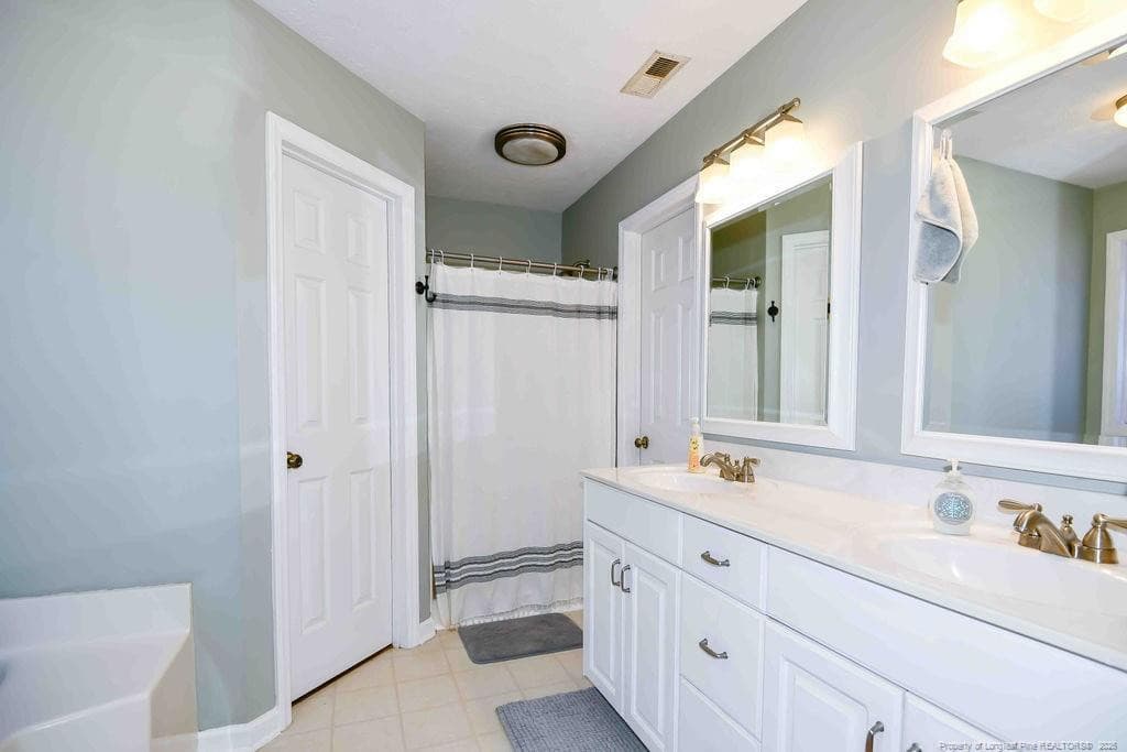 Master bath with shower - 256 Arlington Drive, Cameron, NC 28326
