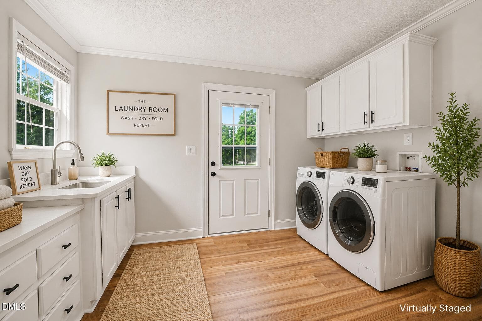 Laundry room staged - 694 John Lee Road, Dunn, NC 28334