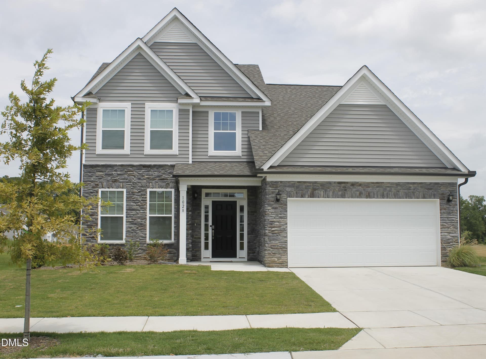 Front of the house KeyToLifestyle.com - 1028 Channel Drop Lp, Zebulon, NC 27597
