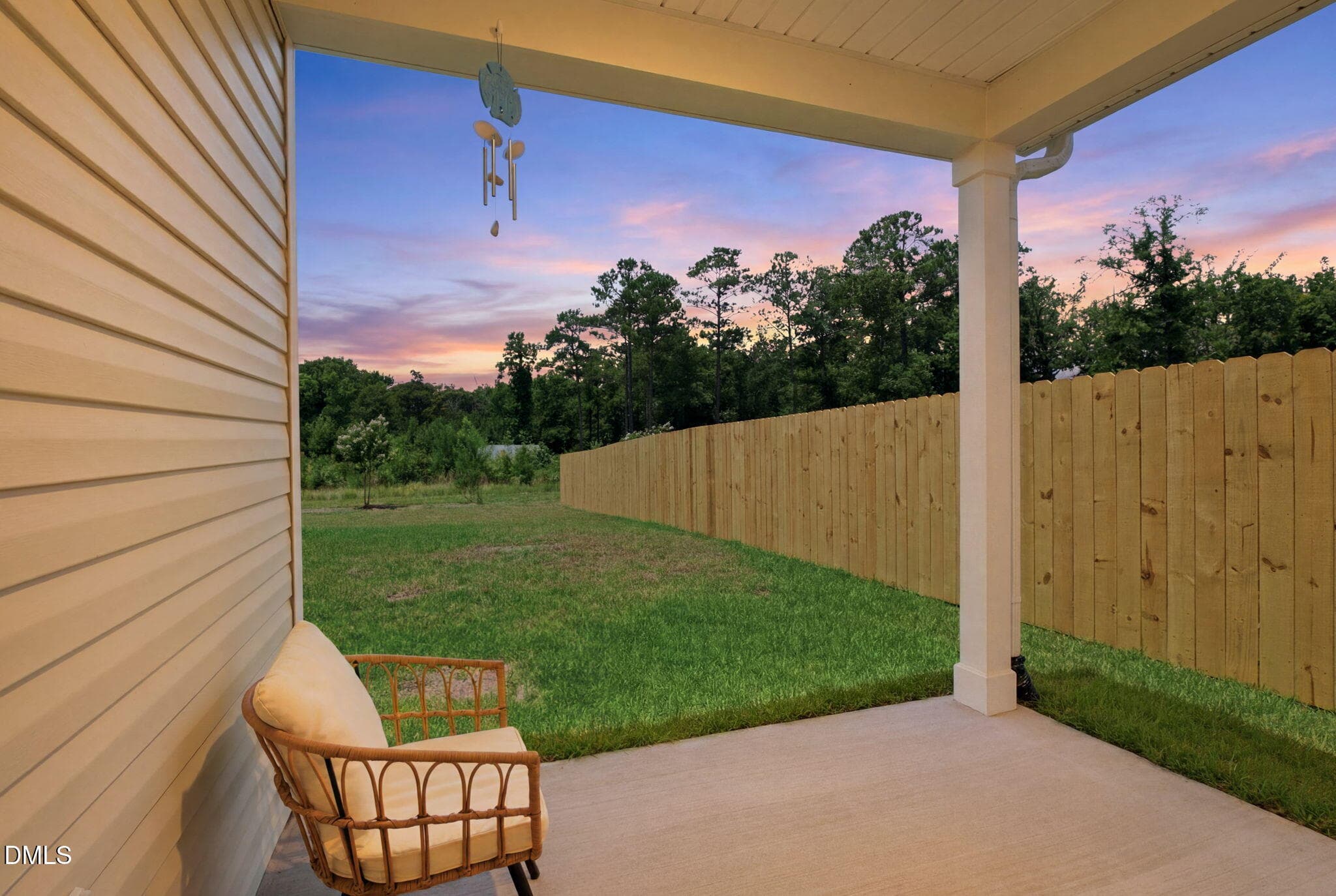 twilight-covered patio-3 - 249 Ocean Pointe Boulevard SE, Bolivia, NC 28422