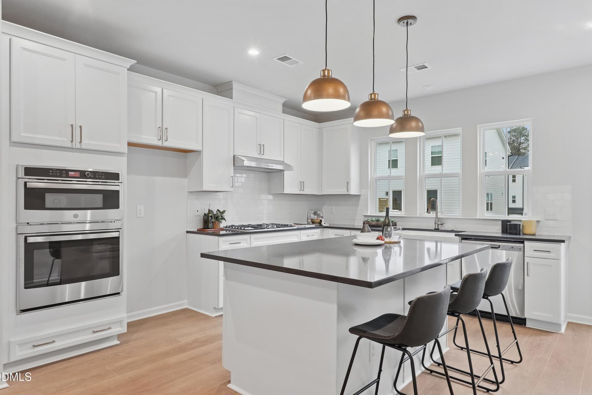 Twinleaf Townes 24_Kitchen 2_2.27.26_web - 702 Hyperion Alley, Wake Forest, NC 27587