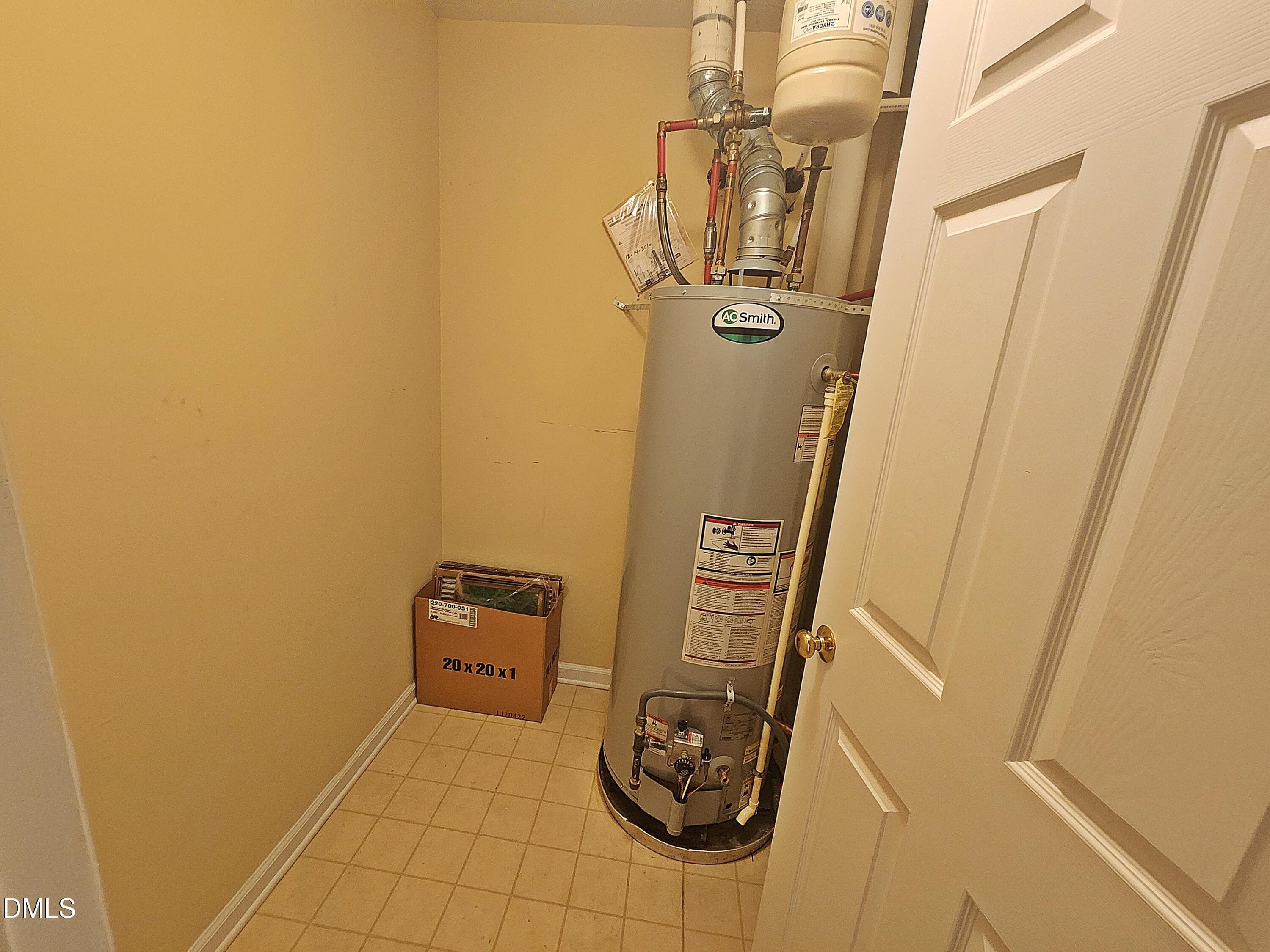 water heater closet - 1615 Dunraven Drive, Raleigh, NC 27612, Raleigh