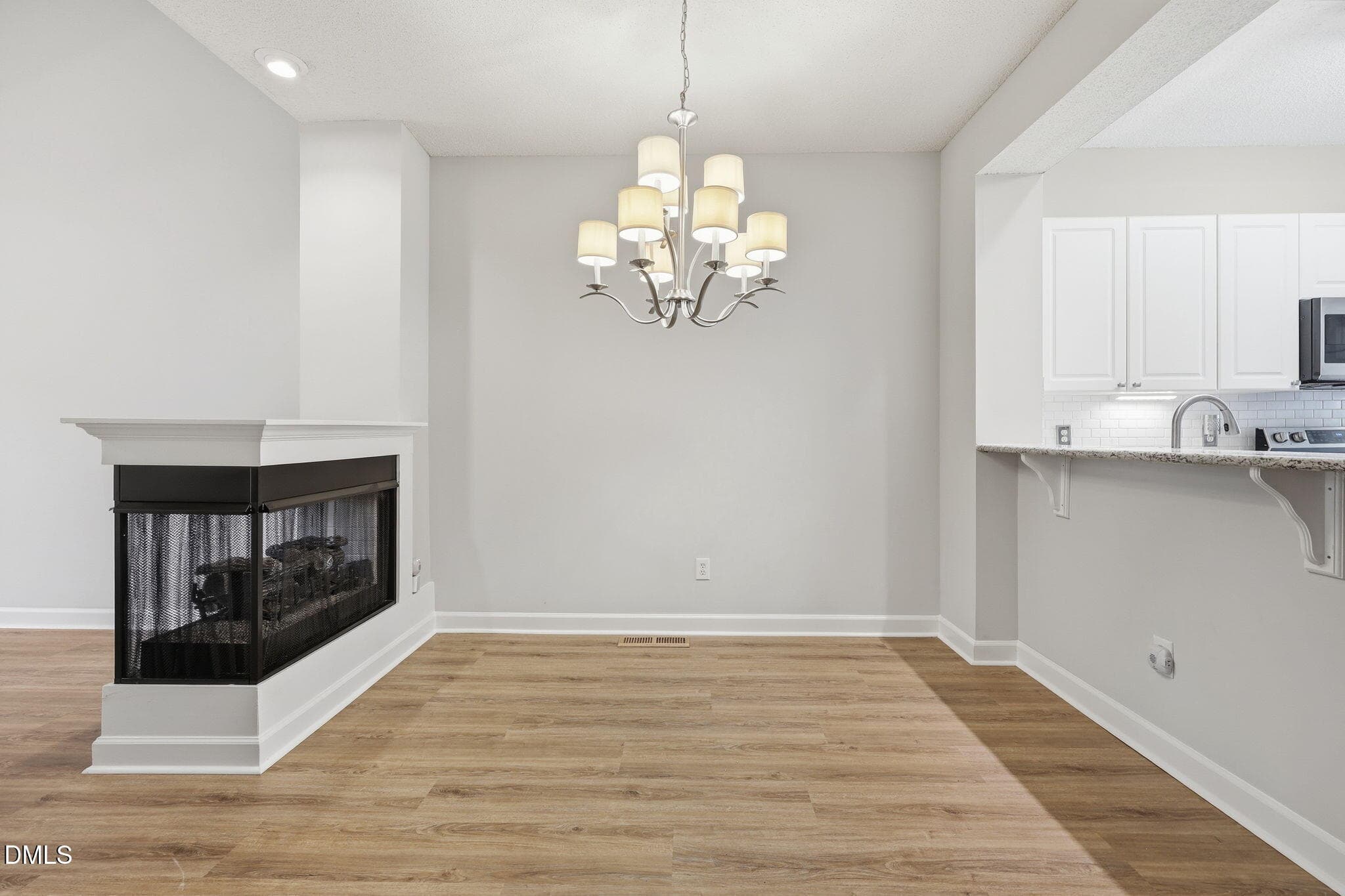Dining Area / Fireplace - 8305 Amber Leaf Court, Raleigh, NC 27612, Raleigh