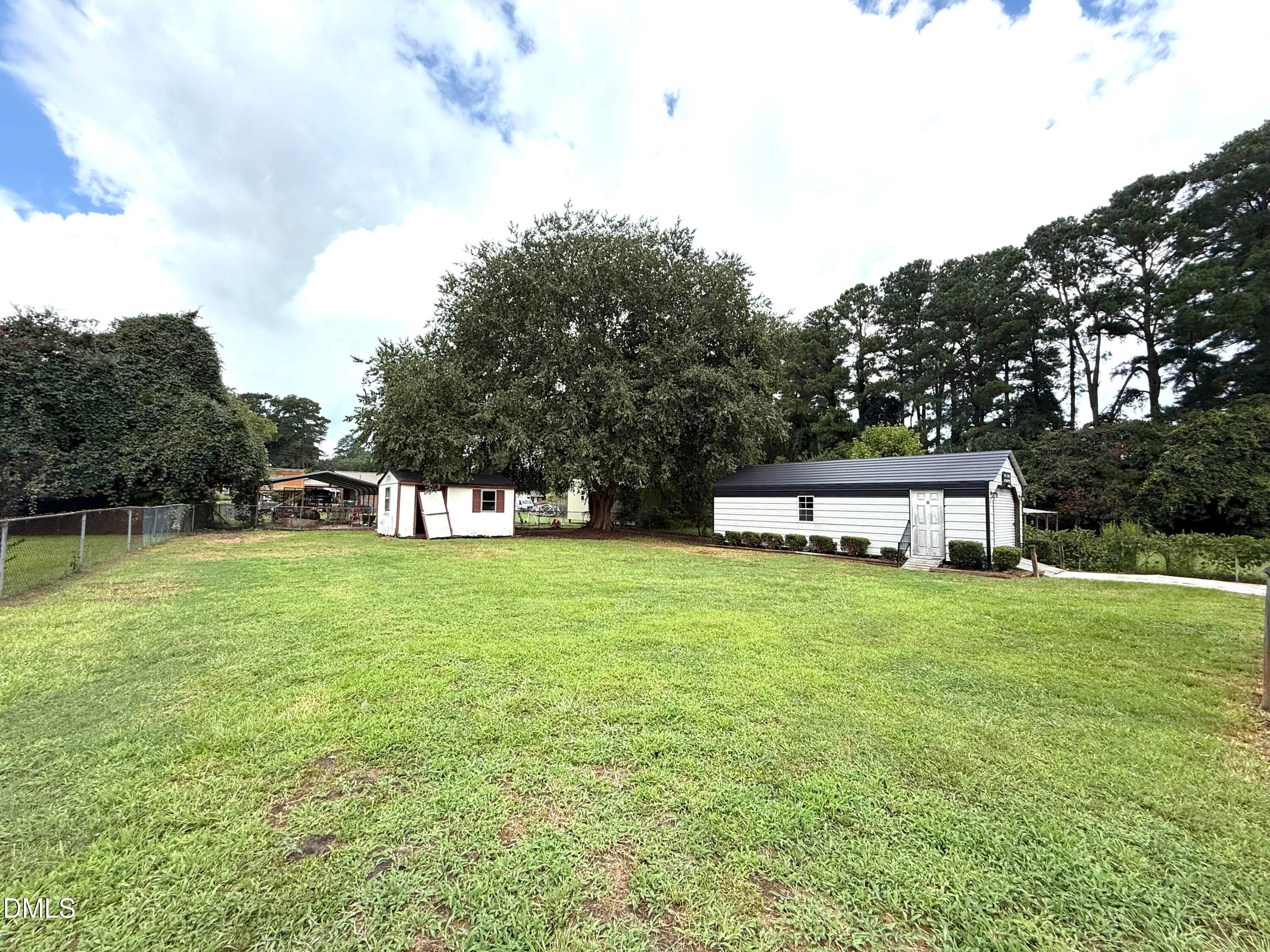 Back yard with second storage bldg - 2248 Longleaf Pine Drive, Kinston, NC 28504