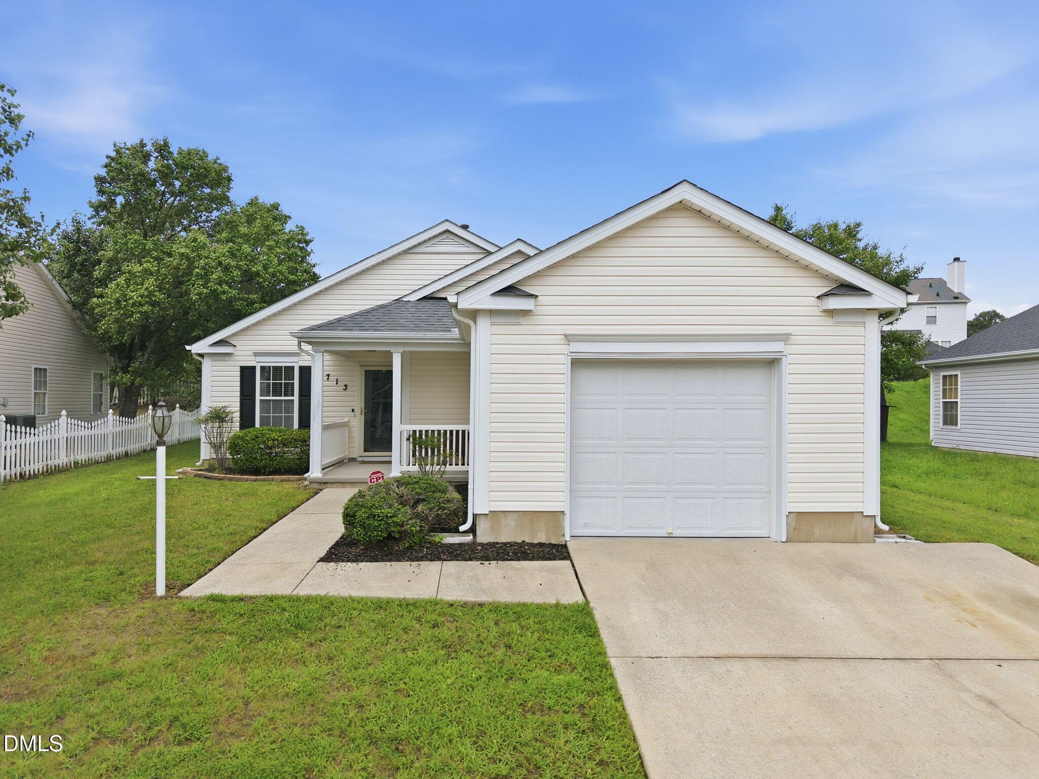 Welcoming front view and driveway - 713 Quartz Drive, Durham, NC 27703, Durham