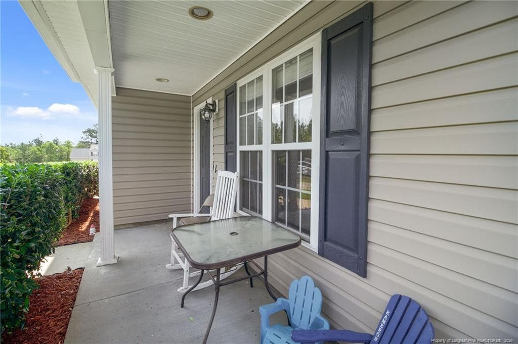Covered front porch - 80 Chinkapin Oak Circle, Bunnlevel, NC 28323