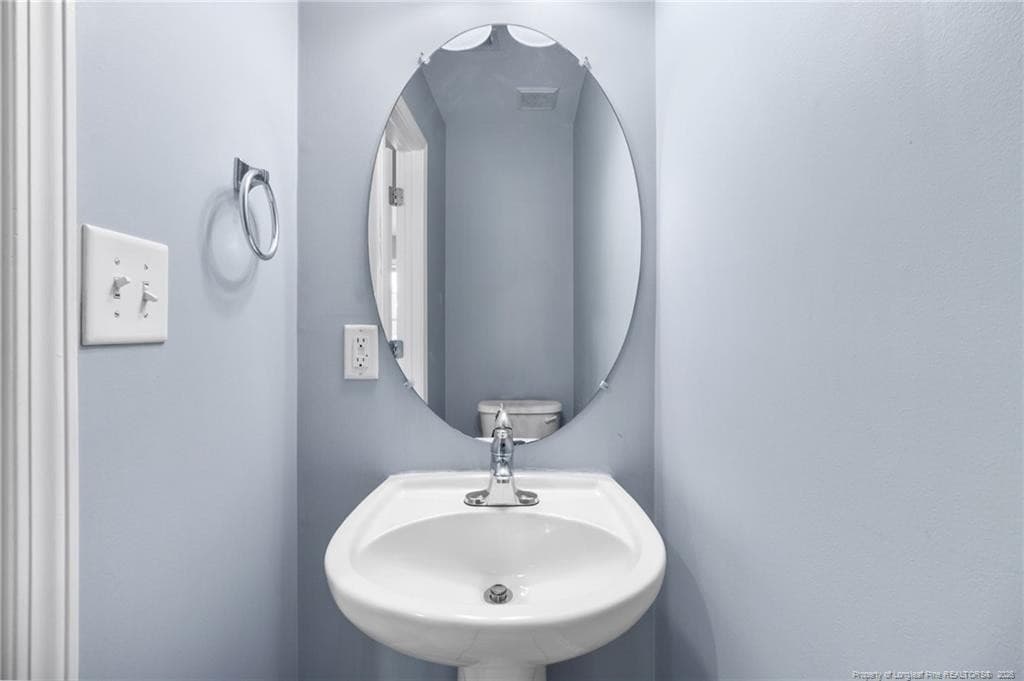 Half bath - 80 Chinkapin Oak Circle, Bunnlevel, NC 28323