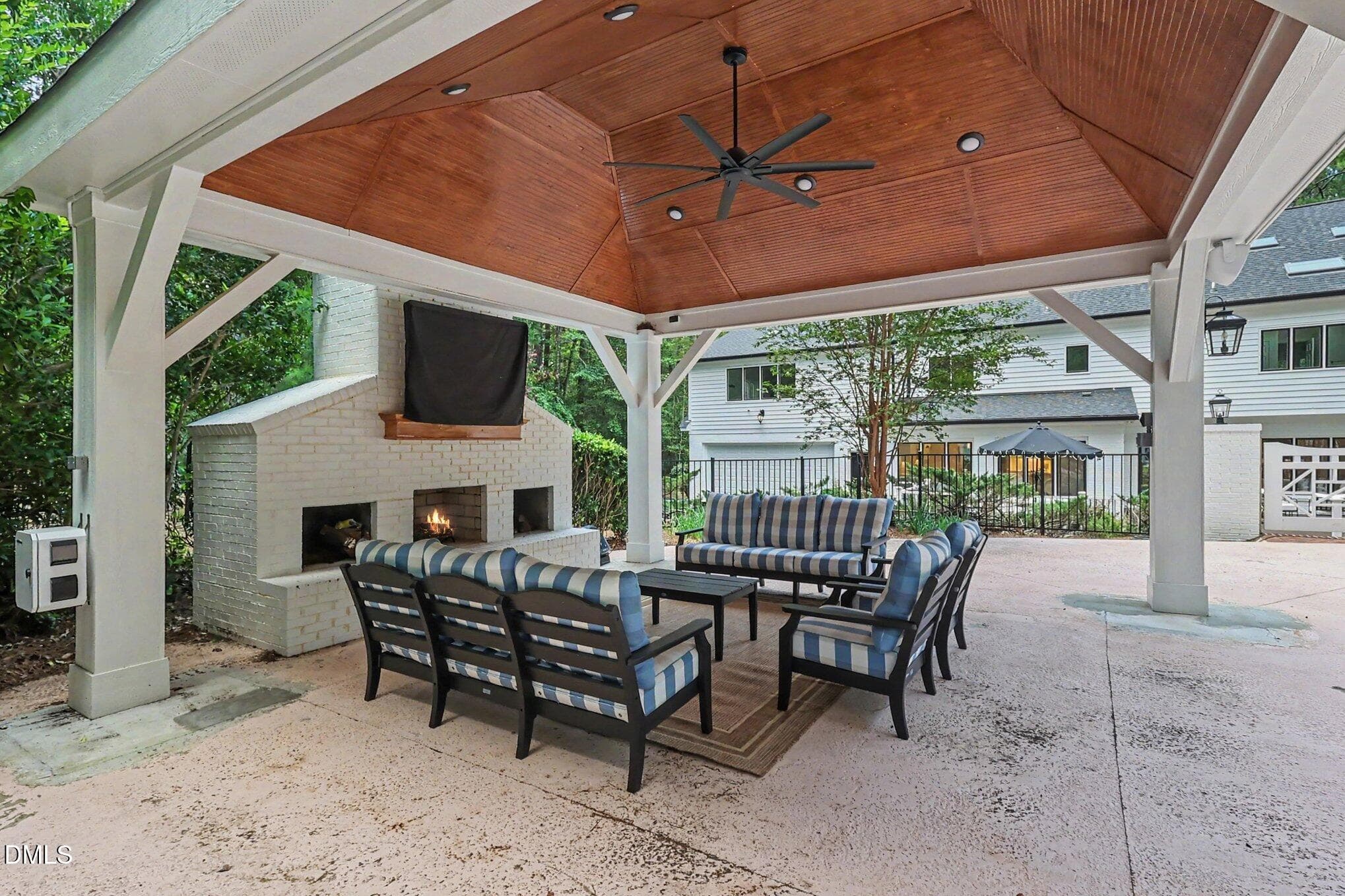 pool pavilion with fireplace & TV - 10773 Trego Trail, Raleigh, NC 27614, Raleigh