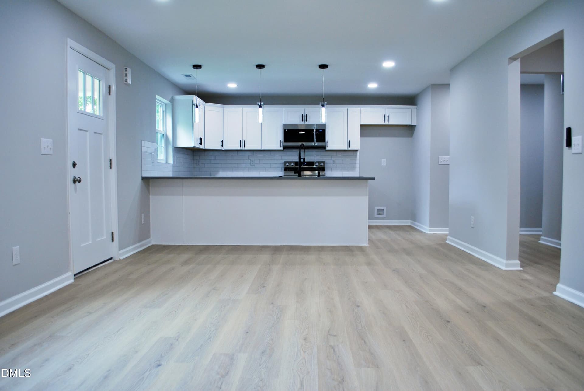 7 Living Room into Kitchen - 421 E Webb Street, Mebane, NC 27302