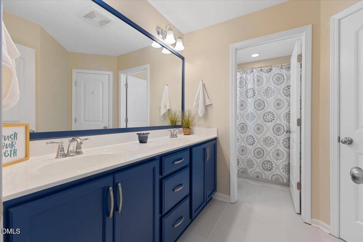 Jack & jill bathroom - 819 Lake Artesia Lane, Fuquay Varina, NC 27526