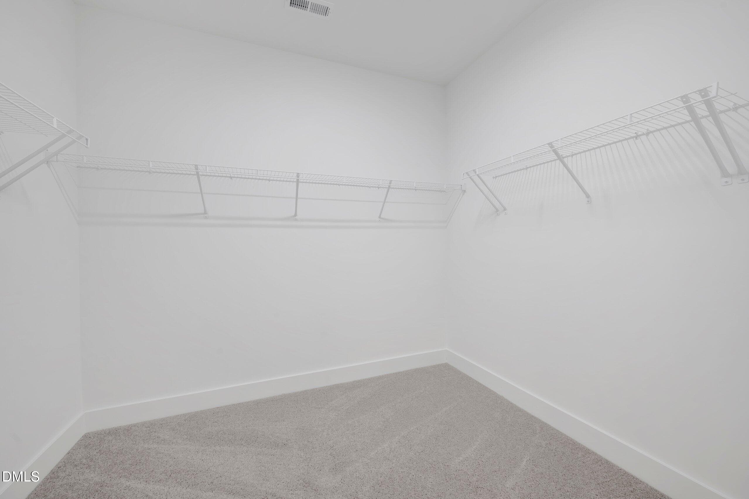 Primary Walk-in Closet - 144 Golfview Avenue, Benson, NC 27504