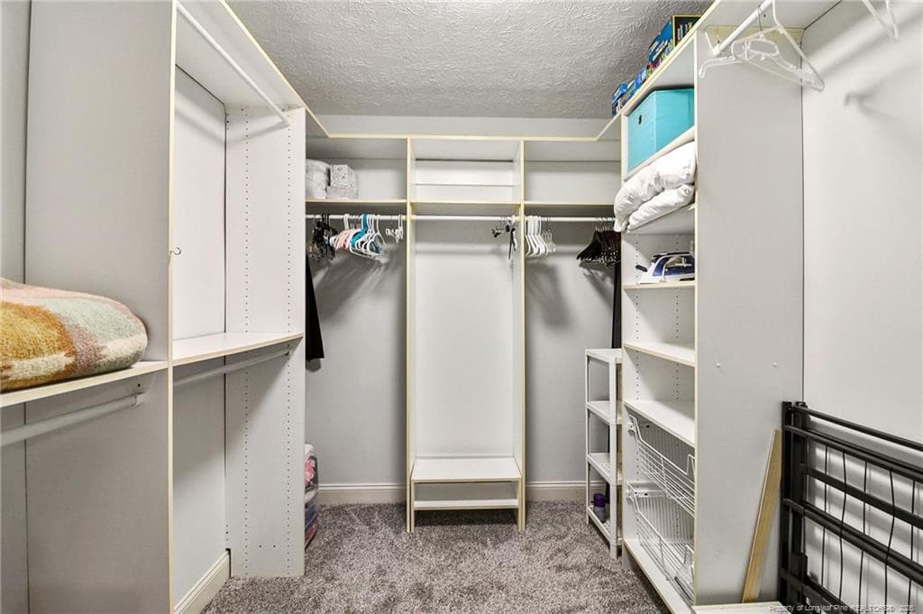 first floor primary closet - 444 Holly Lane, Fayetteville, NC 28305, Fayetteville