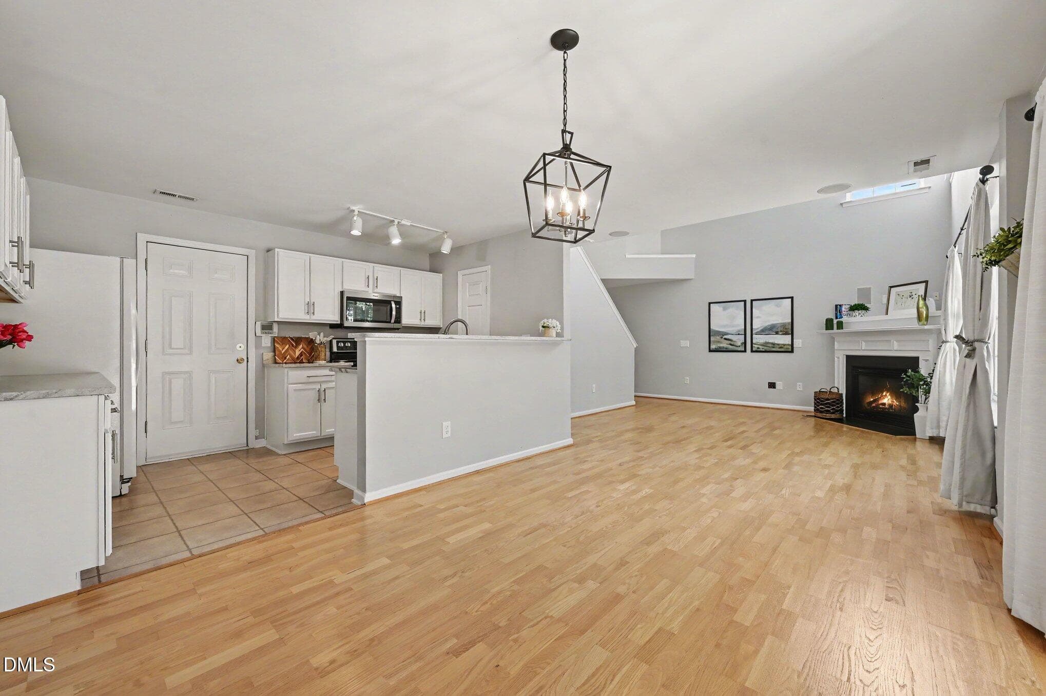 dining into kitchen - 1207 Orchard Oriole Lane, Durham, NC 27713, Durham