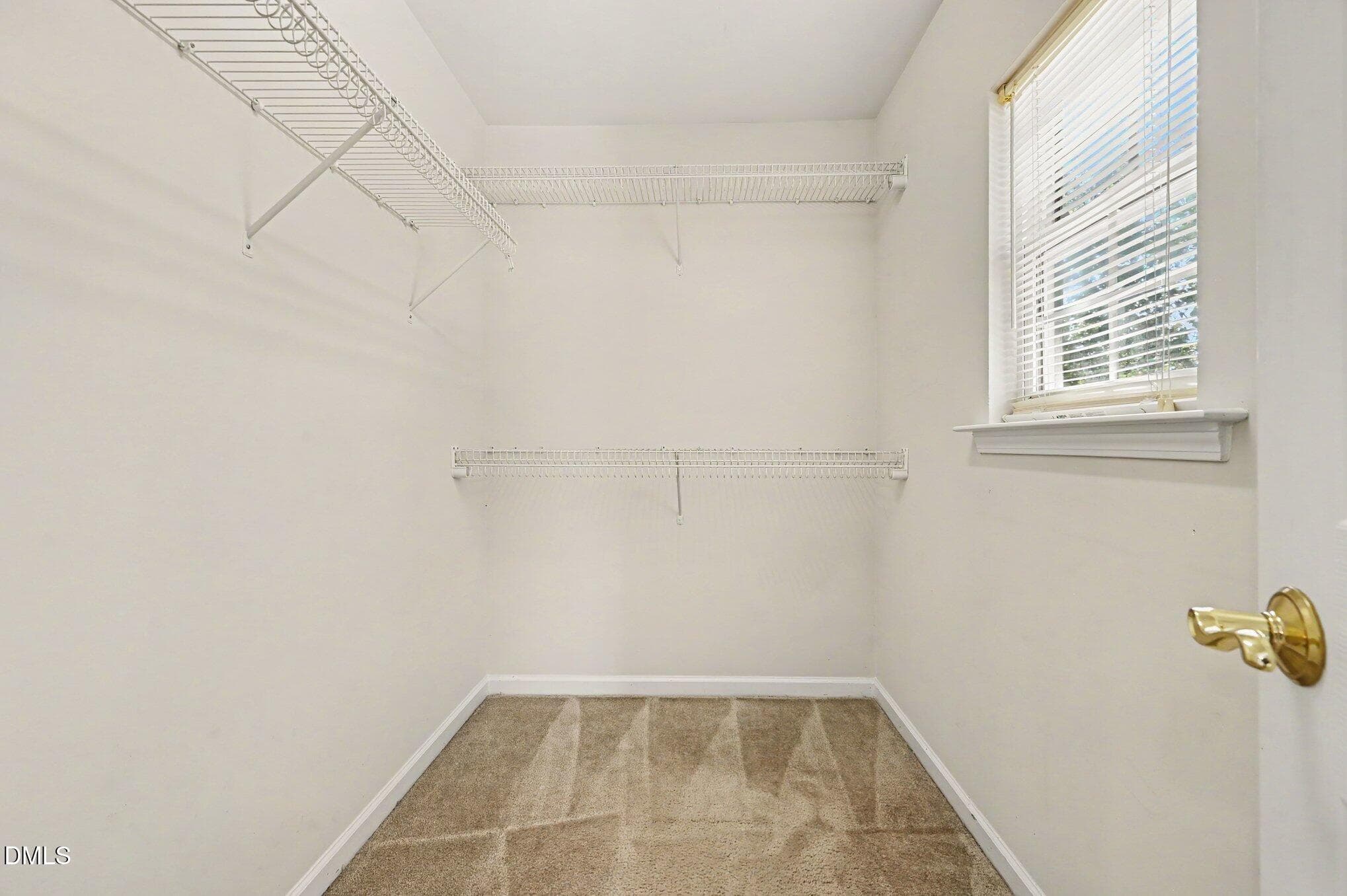 primary closet - 1207 Orchard Oriole Lane, Durham, NC 27713, Durham