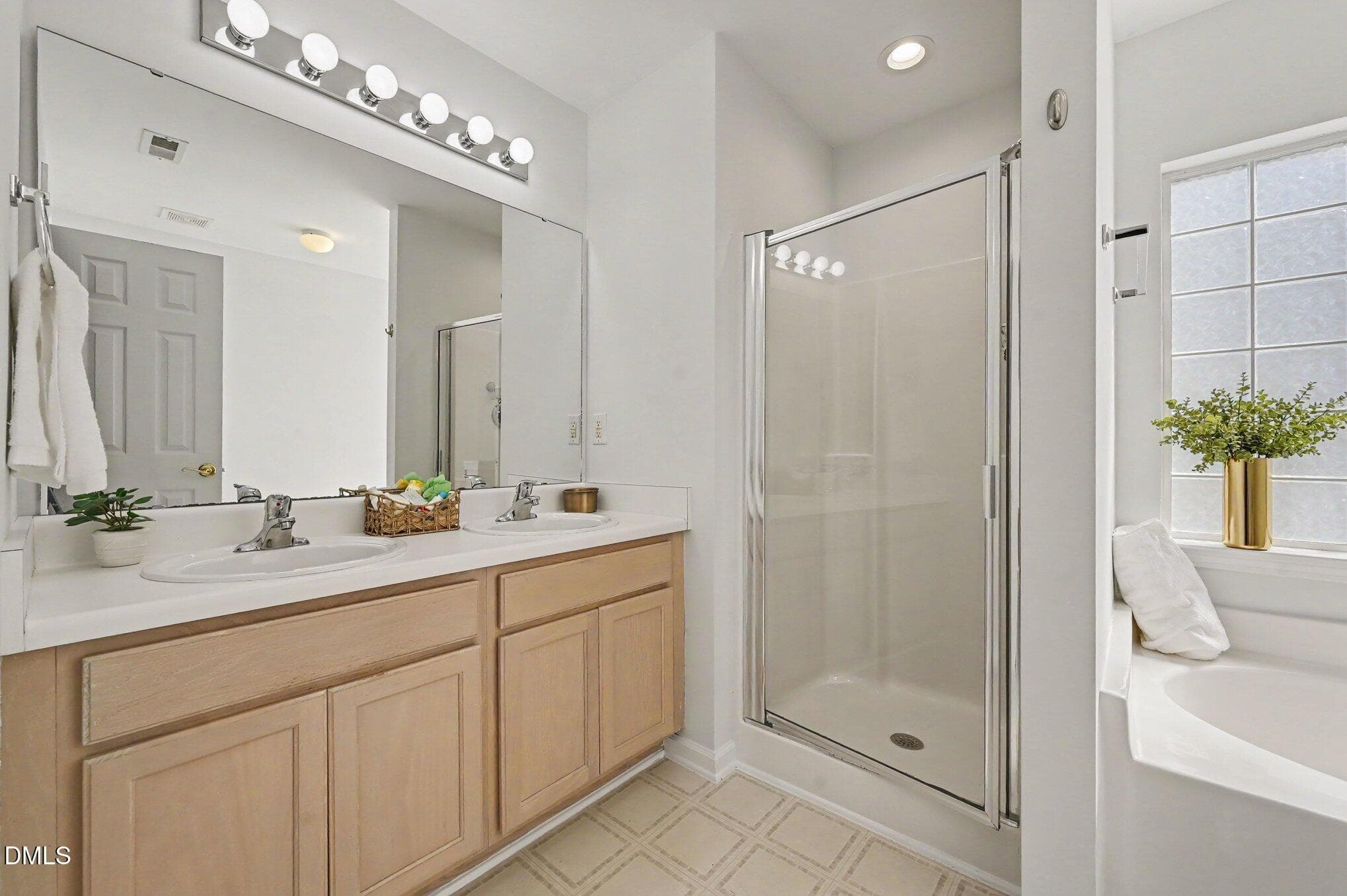 primary sinks and shower - 1207 Orchard Oriole Lane, Durham, NC 27713, Durham