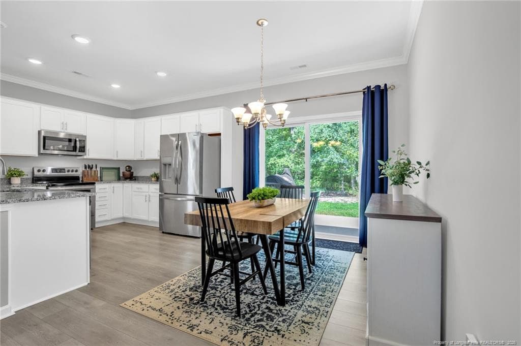 DINING SPACE FOR FULL SIZE TABLE - 105 Nectar Lane, Bunnlevel, NC 28323
