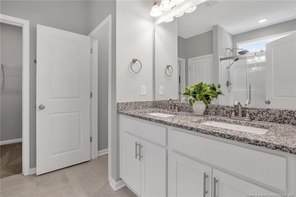 PRIMARY BATHROOM W/DOUBLE SINK VANITY - 105 Nectar Lane, Bunnlevel, NC 28323