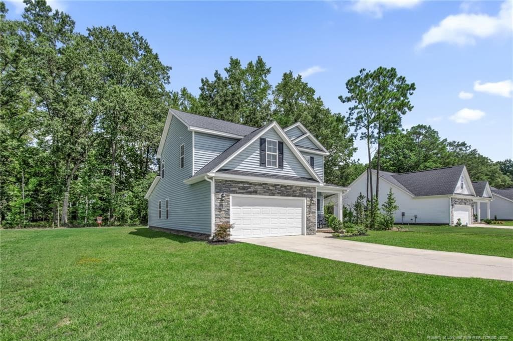 LEFT SIDE VIEW OF HOME AND YARD - 105 Nectar Lane, Bunnlevel, NC 28323