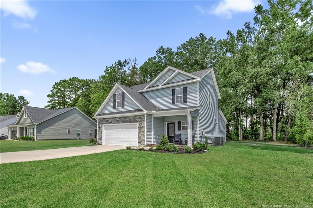 RIGHT SIDE VIEW OF HOME AND YARD - 105 Nectar Lane, Bunnlevel, NC 28323
