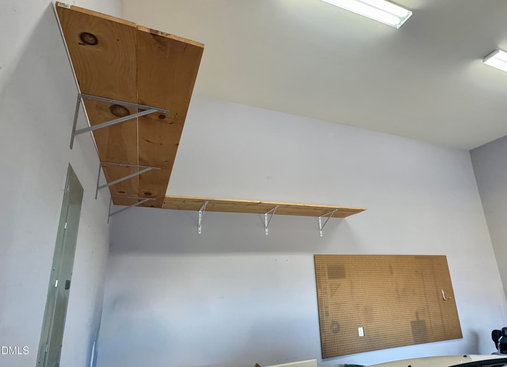 pic garage shelves - 136 Kenneth Lane, Willow Springs, NC 27592