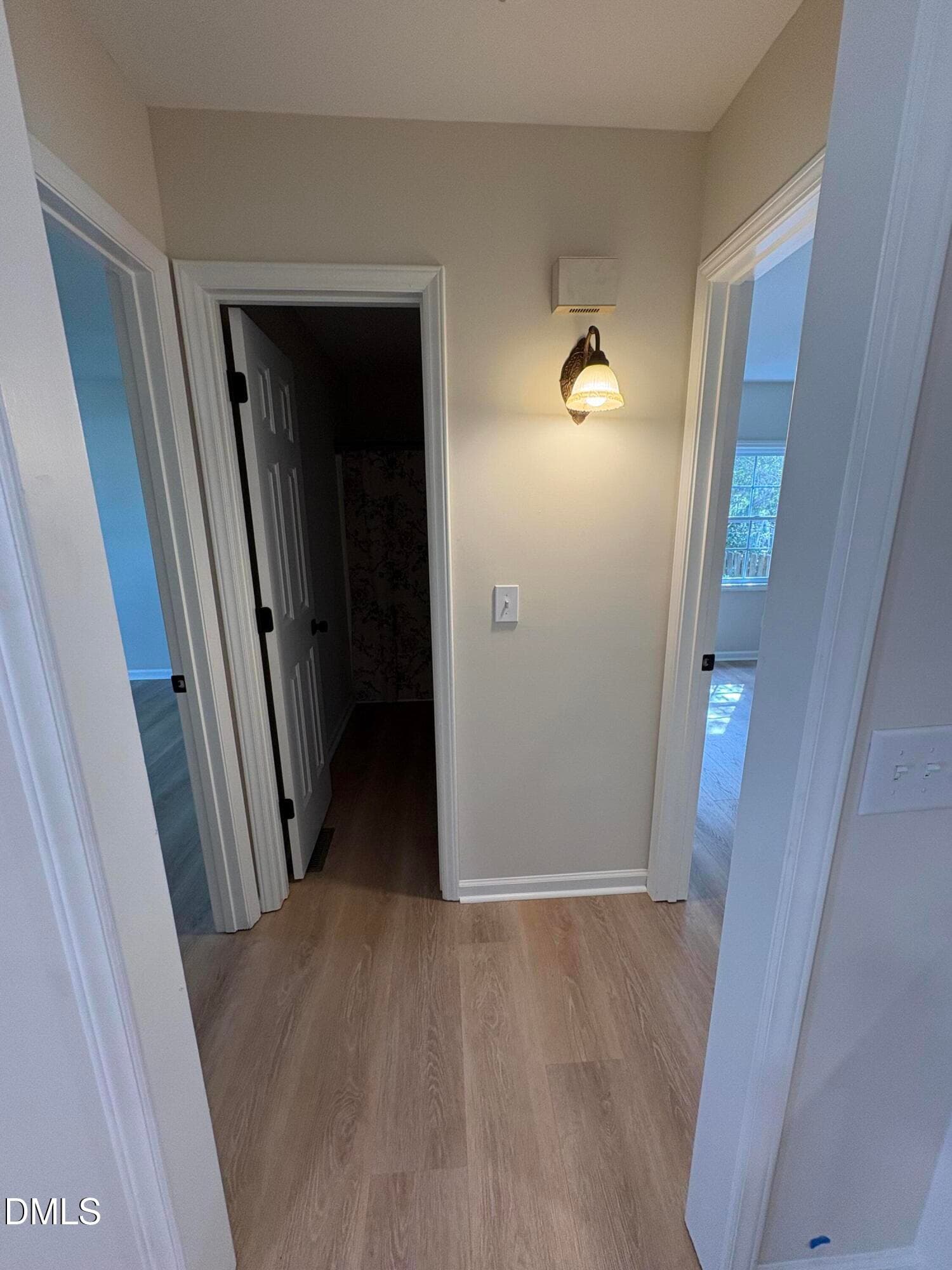 Hallway to secondary bedrooms and bath - 170 Scotts Creek Run, Angier, NC 27501, Angier