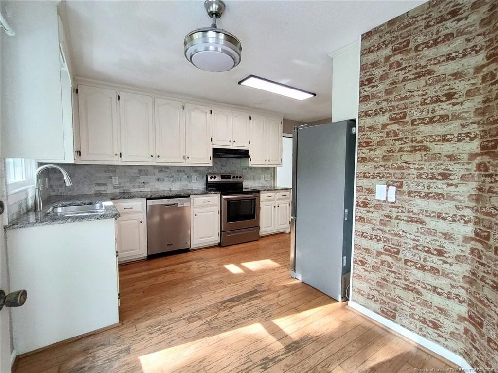 Another view of bright modern kitchen - 1455 Carolina Drive, Sanford, NC 27332