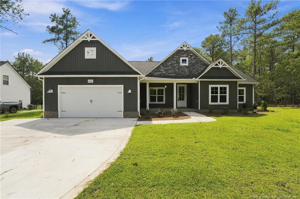 Photo 1 - 26820 Peach Orchard Road, Wagram, NC 28396