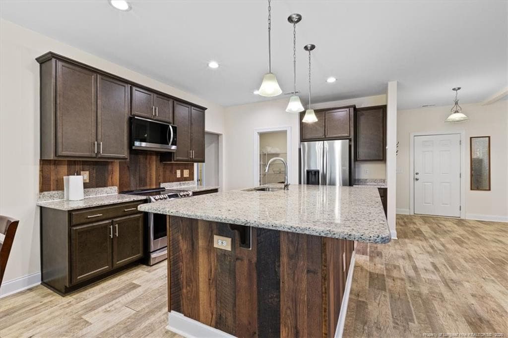 kitchen island - 150 Horseshoe Hill Lane, Carthage, NC 28327