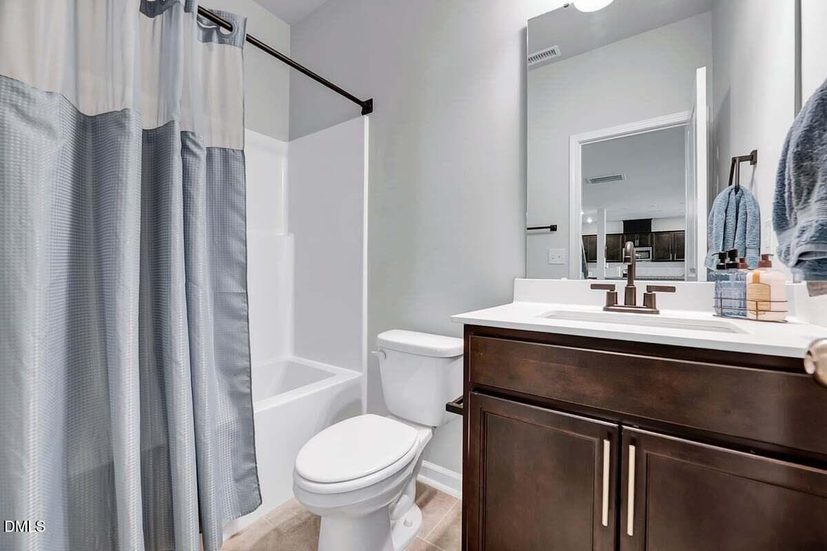 Guest bathroom full bath - 285 Carolina Maple Drive, Franklinton, NC 27525