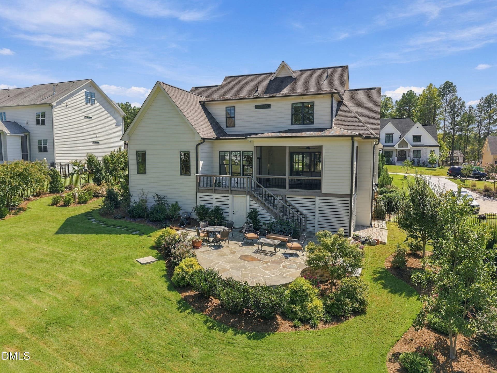 Back of home with raise Terrace - 1221 Perry Bluff Drive, Wake Forest, NC 27587