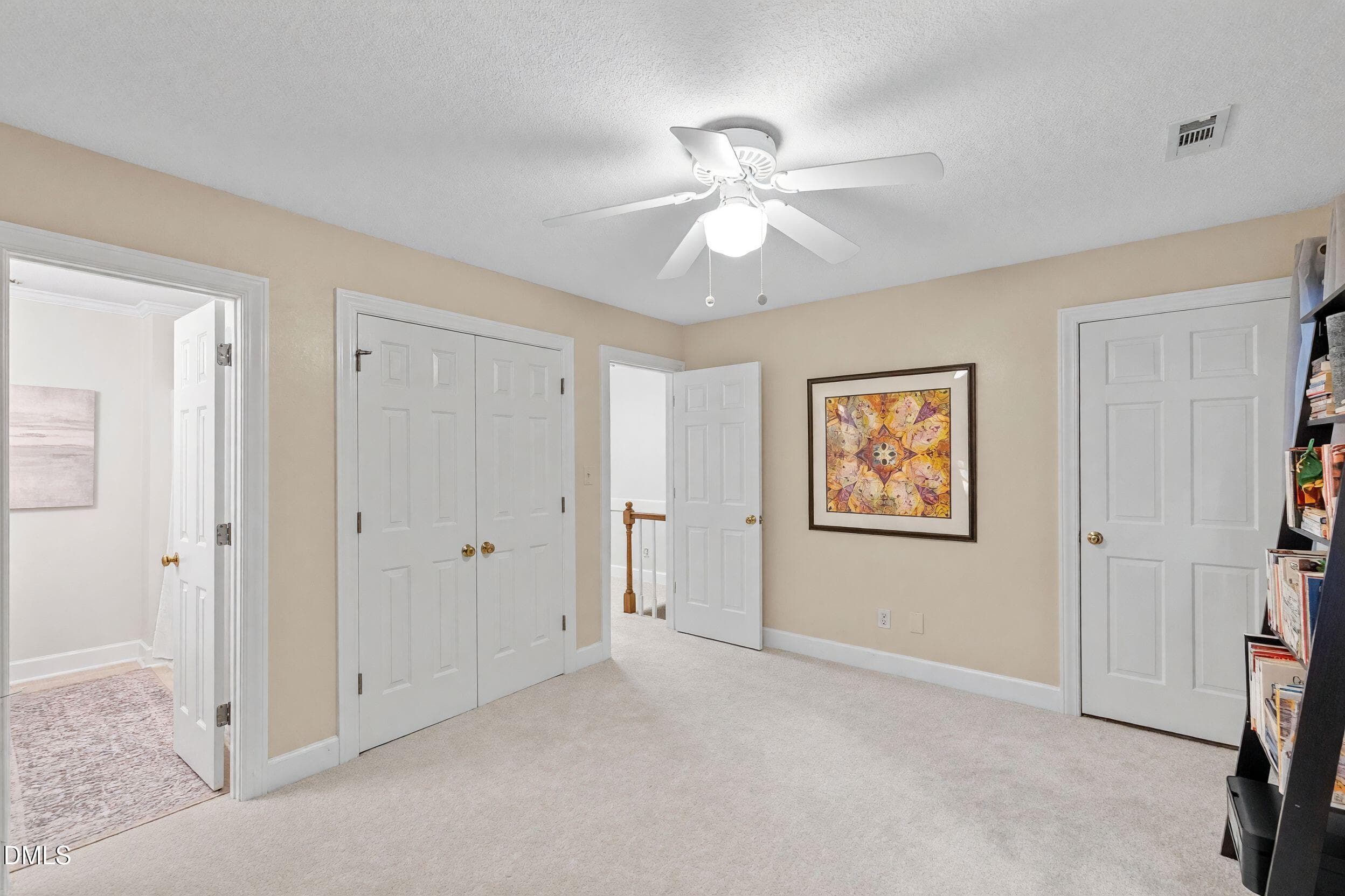 Bedroom 2 with walk-up attic - 129 Hedgerow Court, Cary, NC 27513