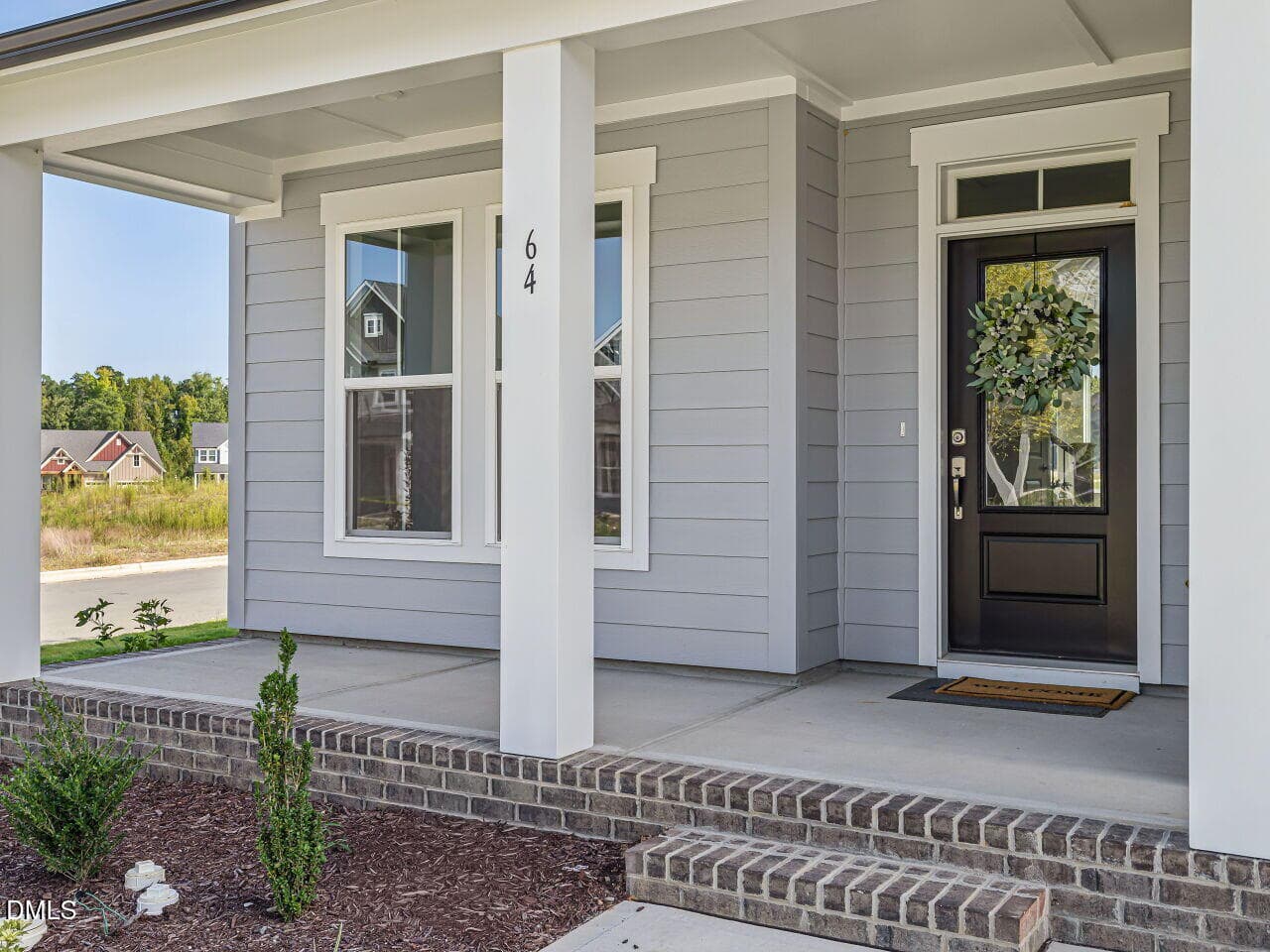 004-1280x960-front-porch - 64 Tranquility Way, Fuquay Varina, NC 27526
