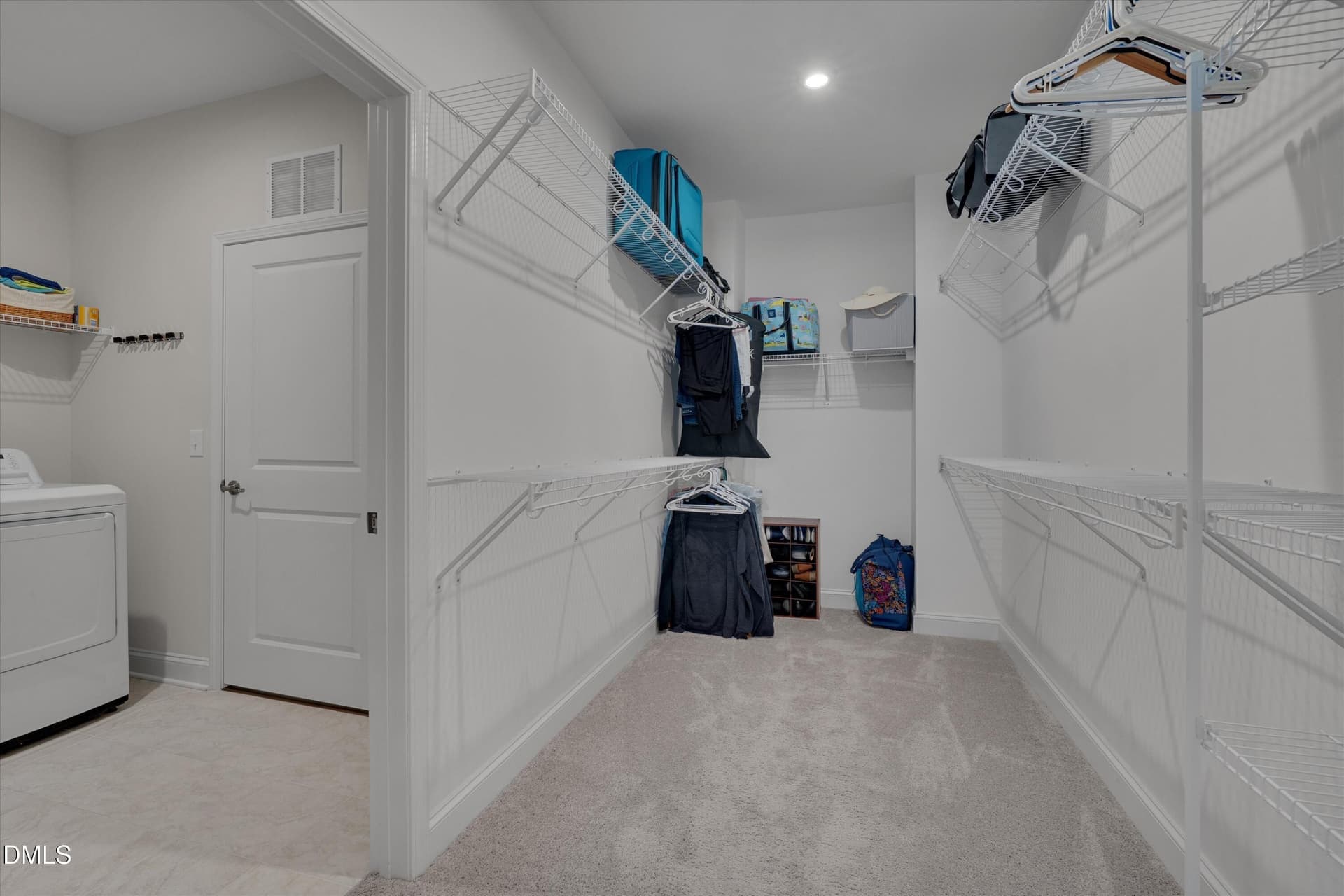 Primary Closet Opens to Laundry - 864 Flower Manor Drive, Wendell, NC 27591