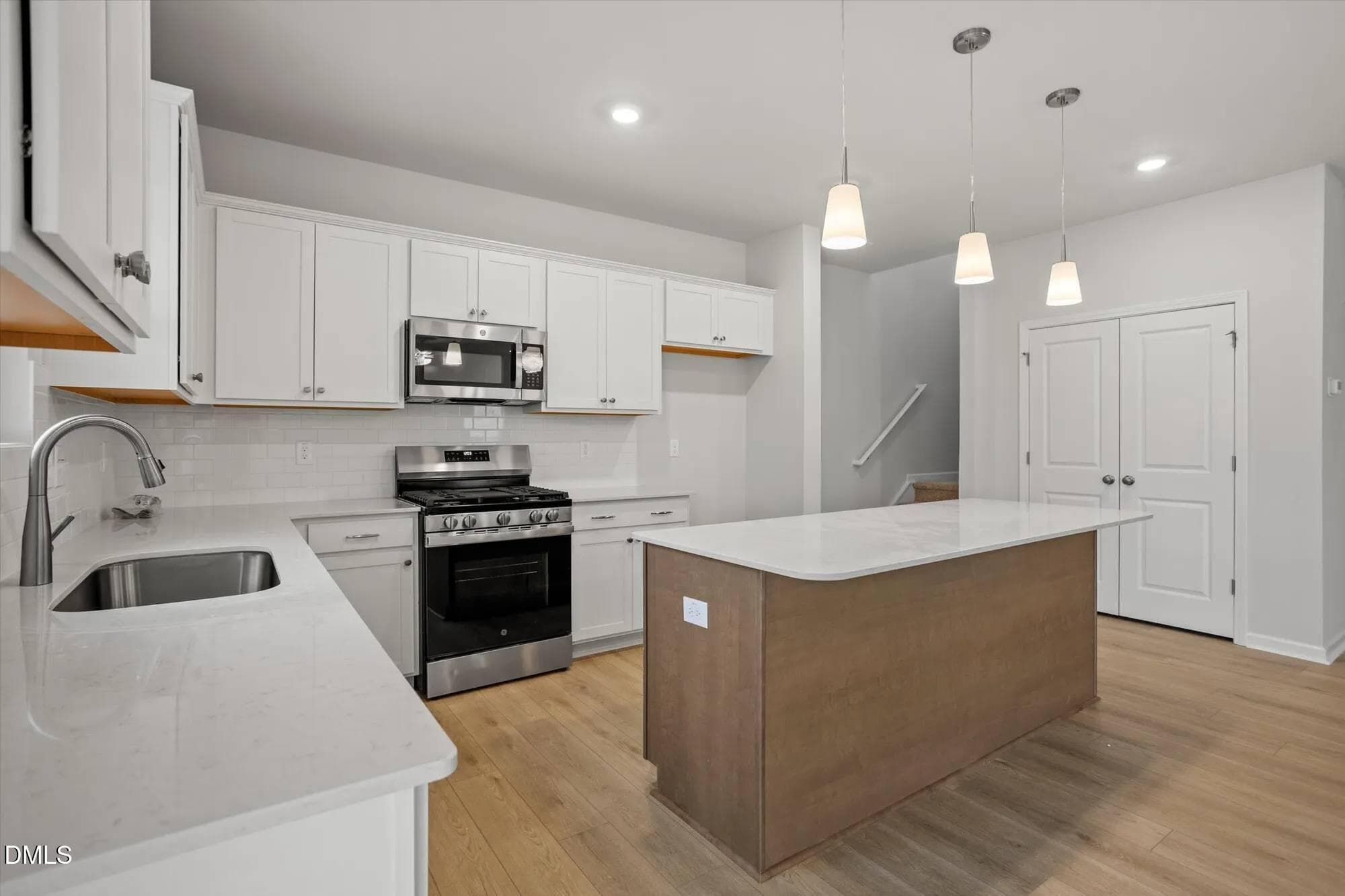 kitchen to stairs - 32 Plantation Drive, Youngsville, NC 27596