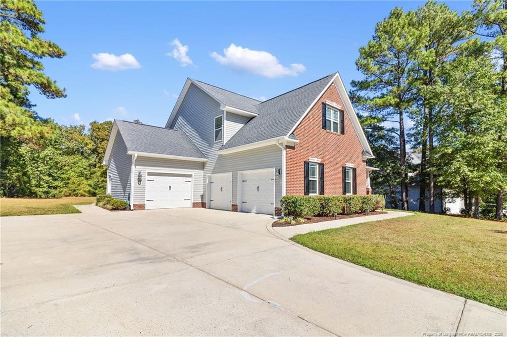 Front - Garages / Driveway - 255 Gwendolyn Way, Fuquay Varina, NC 27526