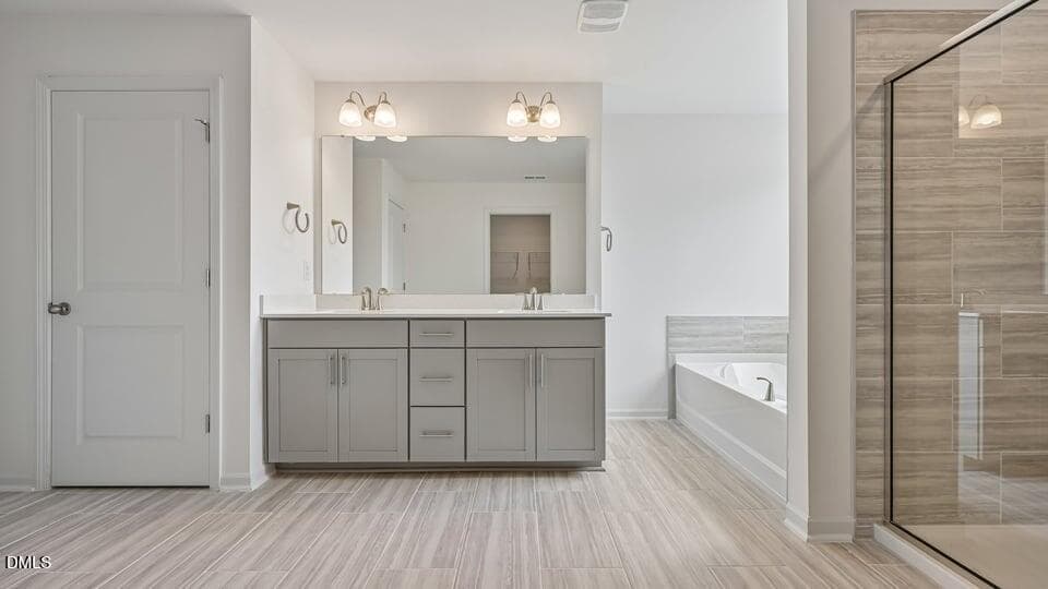 PRIMARY SUITE BATHROOM - 18 Greenwillow Drive, Fuquay Varina, NC 27526