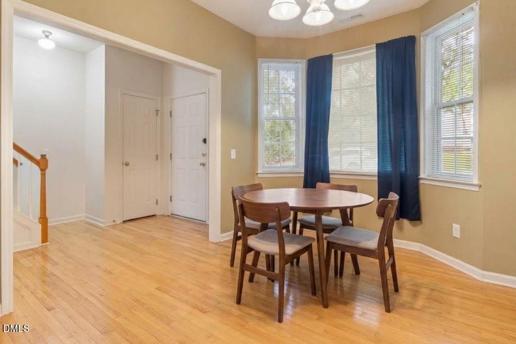 dining room virtual staged - 4414 Pottery Lane, Raleigh, NC 27616