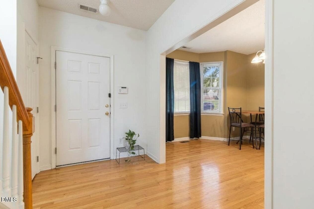 Foyer (virtually staged/decluttered) - 4414 Pottery Lane, Raleigh, NC 27616