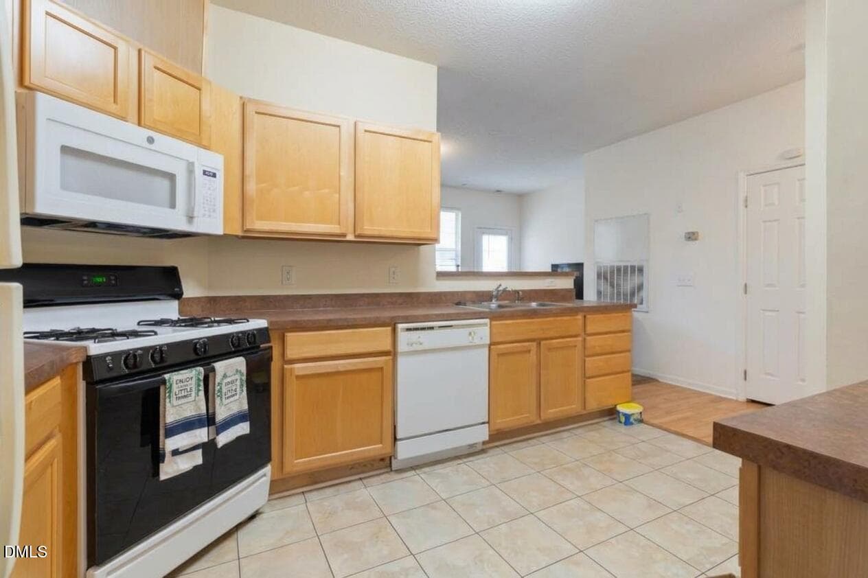Kitchen (virtually staged/decluttered) - 4414 Pottery Lane, Raleigh, NC 27616