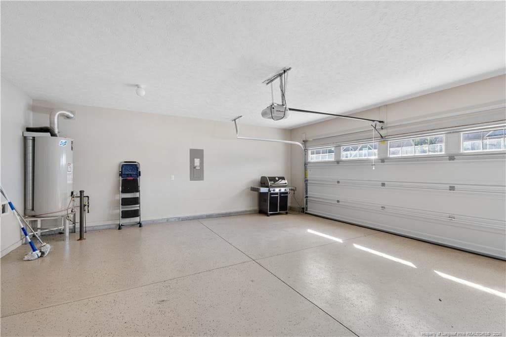 garage with epoxy flooring - 2111 Mannington Drive, Fayetteville, NC 28306