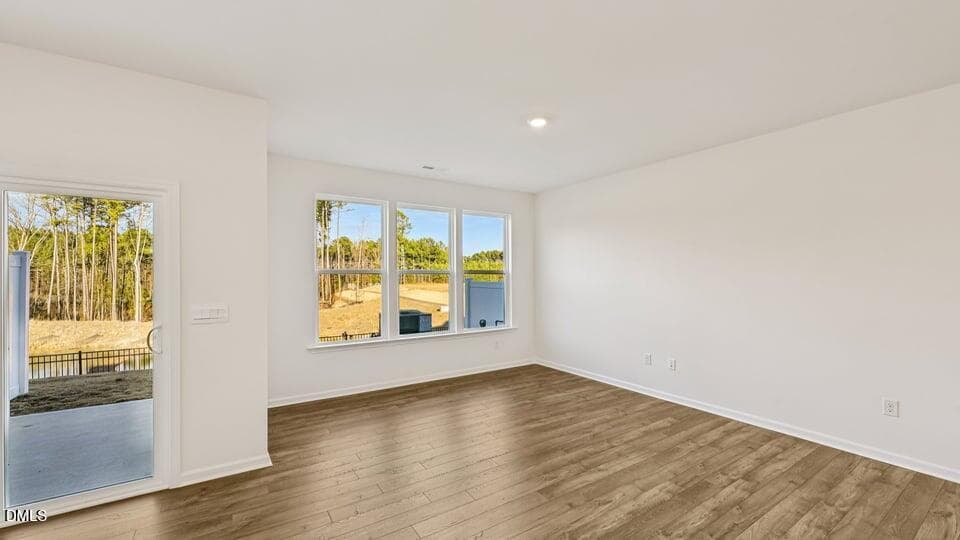 LIVING ROOM AND DINING ROOM - 7450 Eden Bush Drive, Raleigh, NC 27604