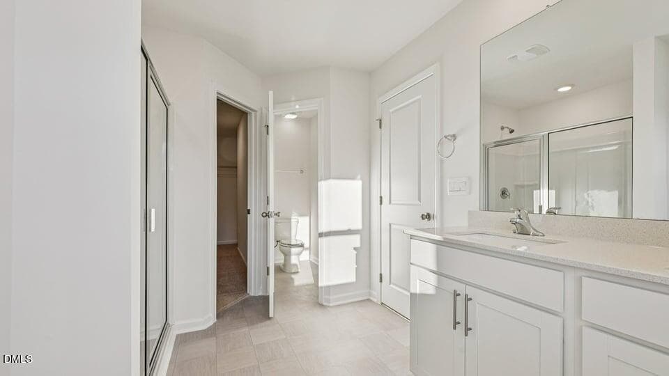 PRIMARY SUITE BATHROOM - 7450 Eden Bush Drive, Raleigh, NC 27604