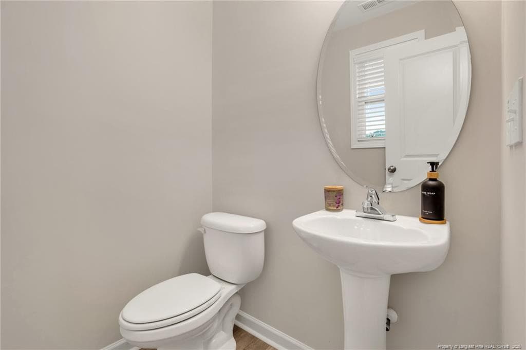 Half bath Downstairs - 4993 Blue Springs Road, Red Springs, NC 28377