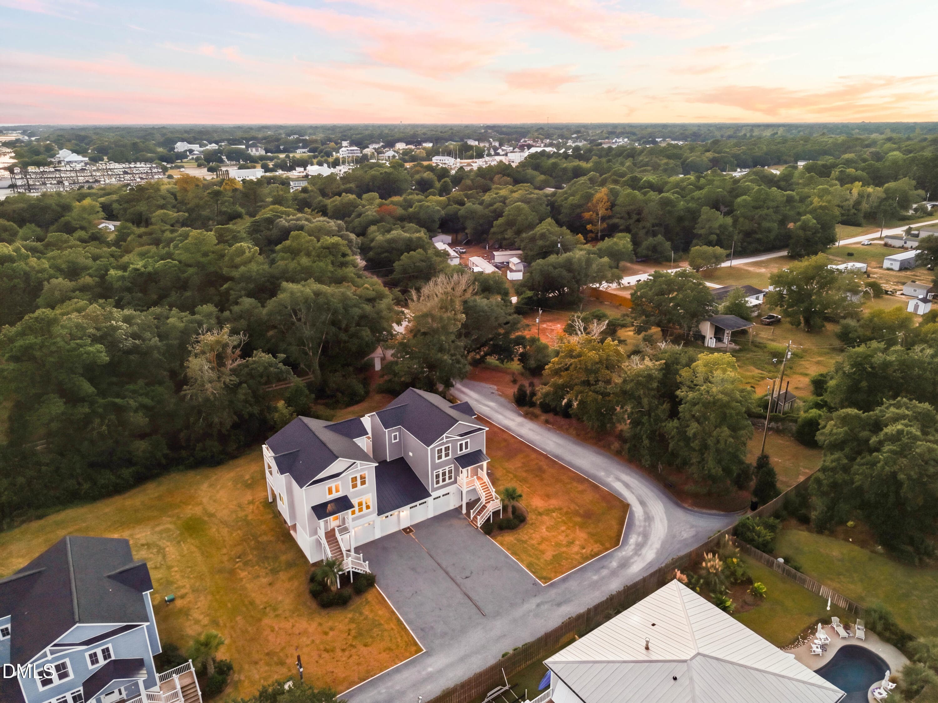 10_front left aerial sunset - 52 Pier View Court, Hampstead, NC 28443, Hampstead