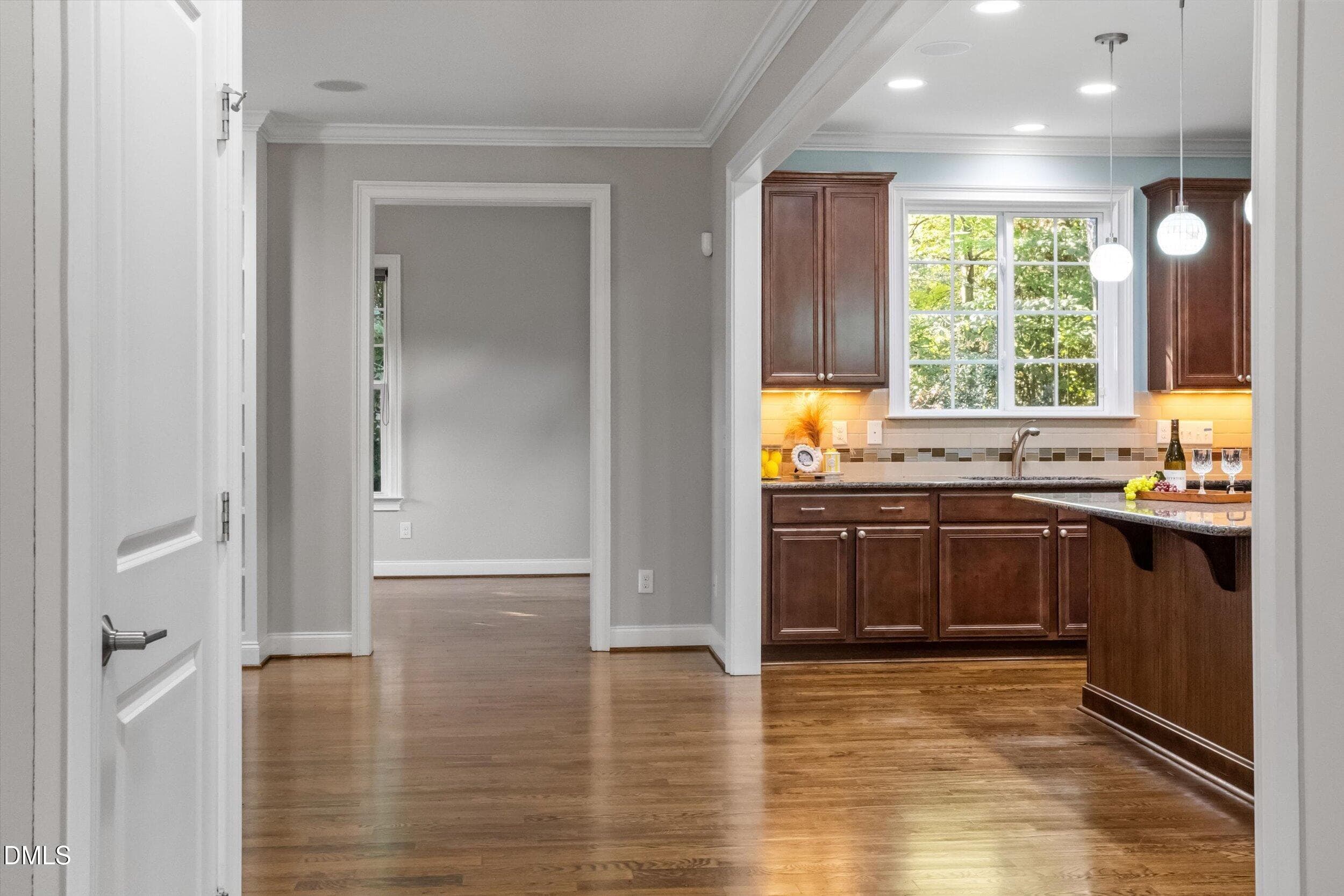 Hall into kitchen - 1604 Doubles Court, Raleigh, NC 27609, Raleigh